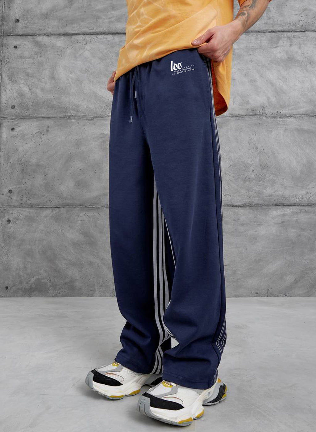 eşofman erkek ve bayan Çok yönlü konfor sunan, bol kesim eşofman altı Bağcıklı ve lastikli bel      %100 pamuk baggy kumaş