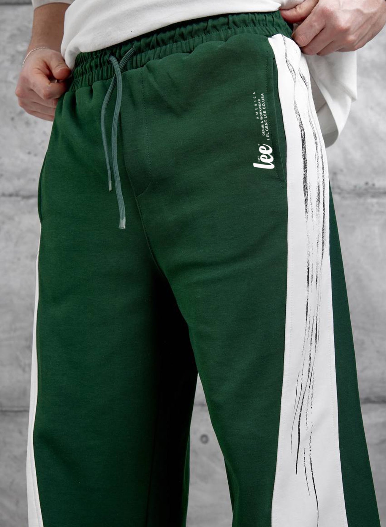 eşofman erkek ve bayan Çok yönlü konfor sunan, bol kesim eşofman altı Bağcıklı ve lastikli bel      %100 pamuk baggy kumaş